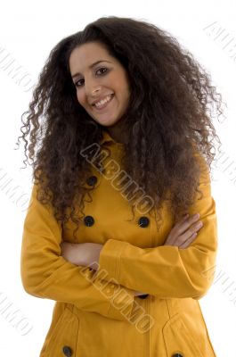 beautiful young female posing with arms crossed