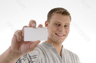 male displaying business card