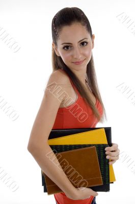 smiling school girl with books
