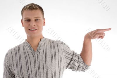 smiling man pointing to the side