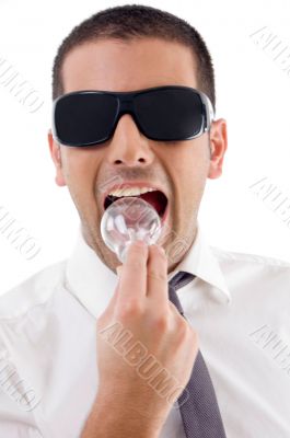 professional man holding light bulb