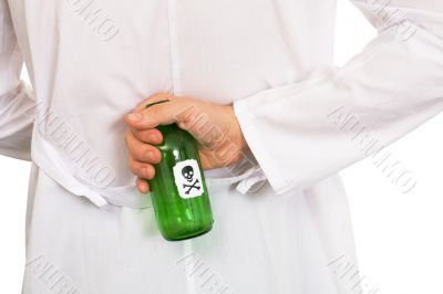Hand with green bottle
