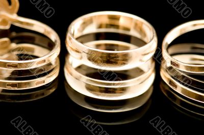 Gold ring on black closeup