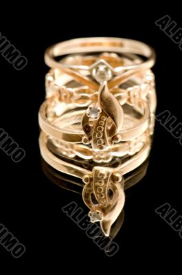 Gold rings on black