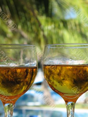 glasses of beer by the pool