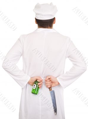 Cook with knife and green bottle