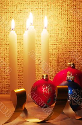 candles, balls and gold ribbons it are Christmas