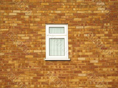 small window on a brick wall