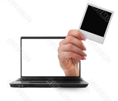 notebook with a hand
