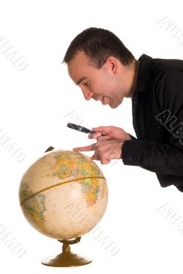 Man Looking At Globe