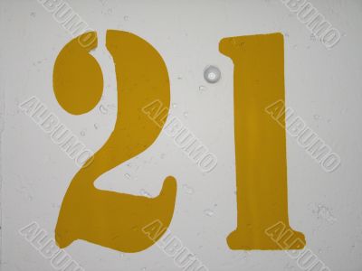 yellow number 21 sign