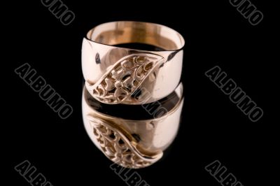 Golden ring macro on black