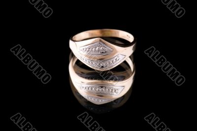 Golden ring on black macro