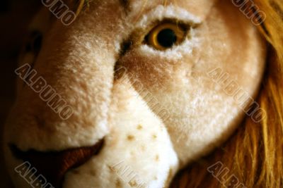 A toy lion face