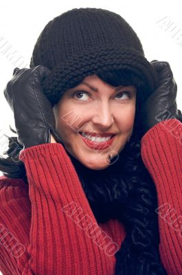 Attractive Woman Holds Her Cap