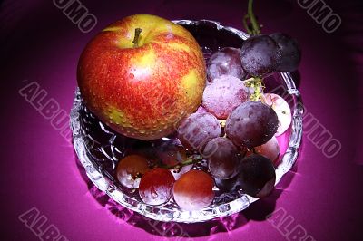 Grape and apple in light