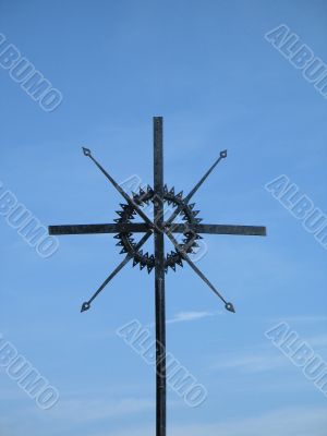 metal cross in a cemetary