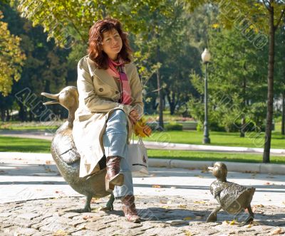 Young woman in autumn park