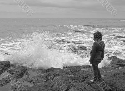 Woman on the ocean coast