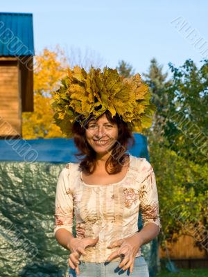 Woman with color autumn chaplet