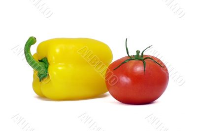 Yellow sweet pepper and red tomato