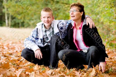 Mother and son in the autumn
