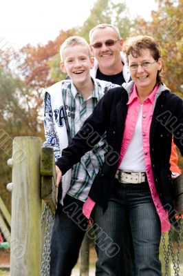 Happy family on the bridge