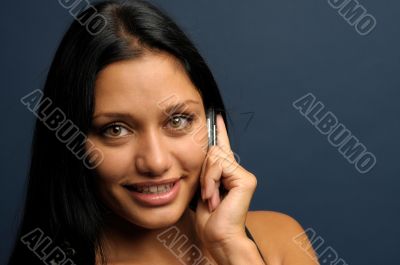 Businesswoman is talking to mobil phone