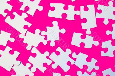 Puzzle Pieces On Pink