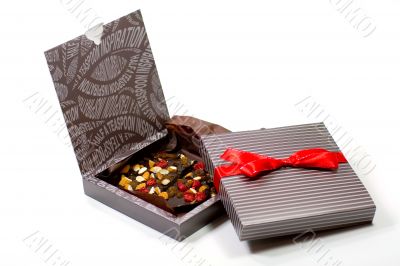 two gift boxes with chocolate