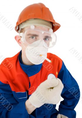 Man in respirator smoking