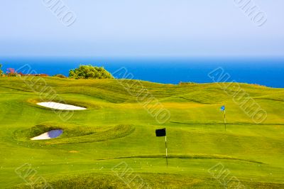 Golf field over the sea