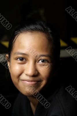 Smiling young asian lady