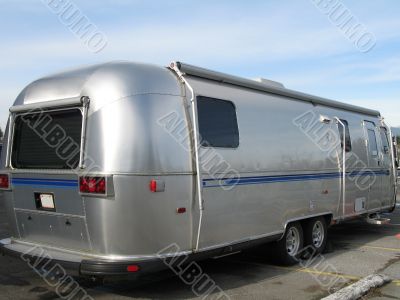 old silver and blue caravan