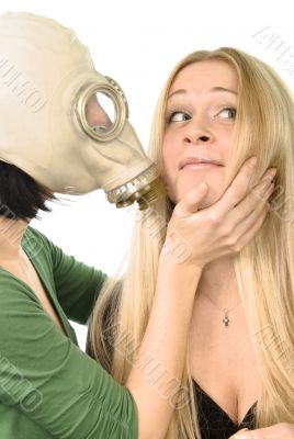 two girls - one in gas mask