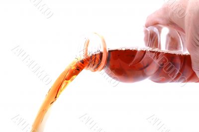 bottle with juice in hand