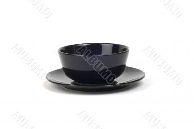 Black bowl on matching plate