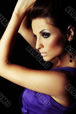 sexy brunette fashion girl in violet dress - portrait