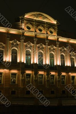 Palace with colonnade and atlases