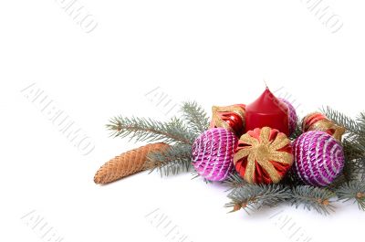 Christmas decorations and branch of fir tree