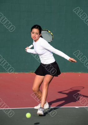 Girl playing tennis
