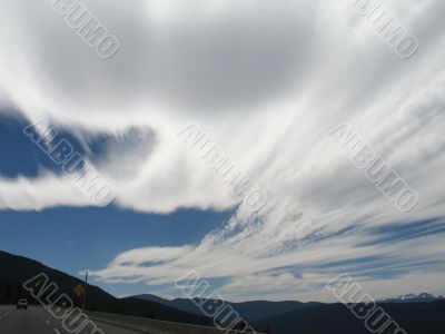 white moving clouds and blue