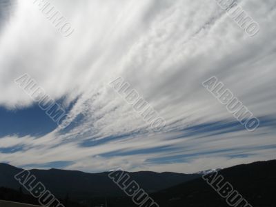 white moving clouds and blue