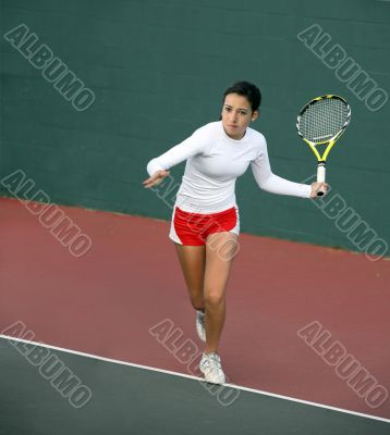 Girl playing tennis