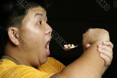 Man eating pills forcefully
