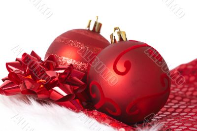 Red Christmas baubles on Santa hat