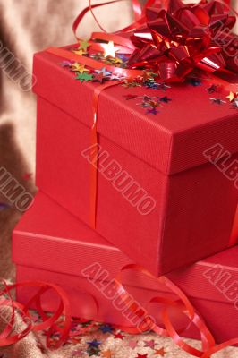 Red gift boxes with bows and stars