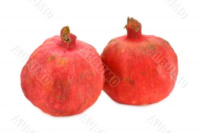 Two pomegranates isolated on white background