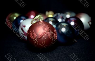 Red glass sphere on Christmas decoration background