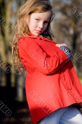Child with a red jacket